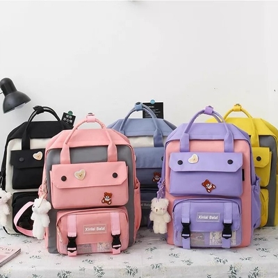 女の子の男の子のために置かれる1つのバックパック セットのランドセルに付き学生のキャンバス4つ