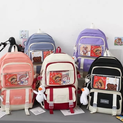OEMの1.35人のインチの女の子のランドセルは1つのバックパックの吊り鎖の鉛筆袋に付き大容量5つを置いた